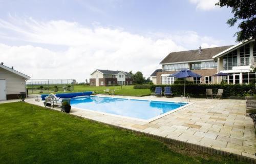 Landhotel De Ijsvogel Sint Nicolaasga Dış mekan fotoğraf