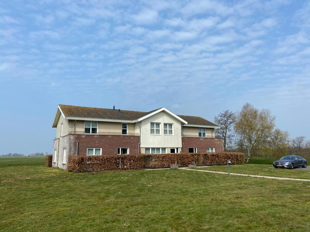Landhotel De Ijsvogel Sint Nicolaasga Dış mekan fotoğraf